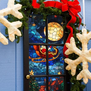 Detailed Santa Claus sleigh stained glass window sticker with vibrant Christmas decor