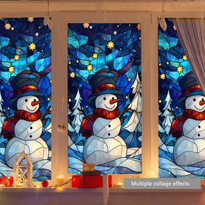 Artistic stained glass style Christmas window clings featuring a snowman and starry night