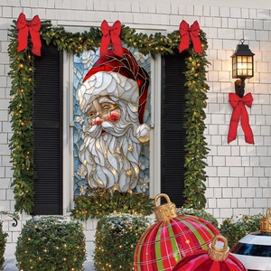 Detail of Santa Claus window sticker with colorful stained glass effect on glass window