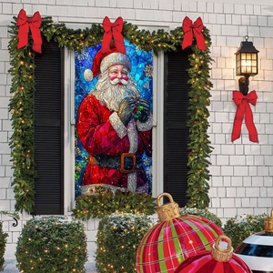Close-up of Santa Claus window sticker in mosaic stained glass style on house window