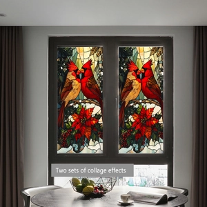 Close-up of double cardinals and poinsettia patterns on stained glass window film decals