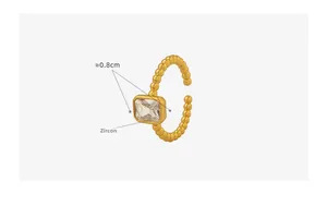 Detail view of gold brass beaded ring with 0.8cm square zircon stone inlay