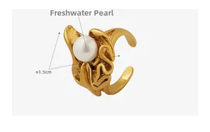 Detail view of gold-plated irregular ring with freshwater pearl and 1.5cm width measurement