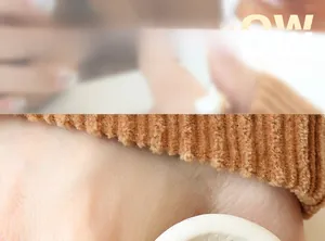 Detailed macro view of caramel ribbed knit cuff with high-quality texture and finish