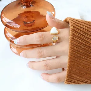 Adjustable gold open ring with triangular shell inlay and sparkling round crystals