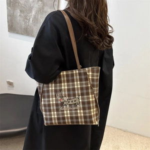Brown plaid tote bag with dachshund embroidery and adjustable straps for daily commuting