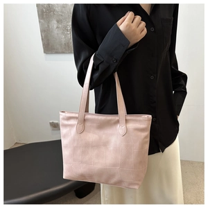Pink geometric patchwork leather tote bag for women with stylish dual handles for daily use