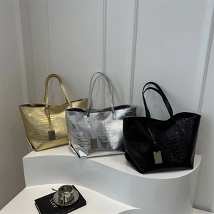 Large croc-embossed tote bags set in metallic gold, silver and black for women
