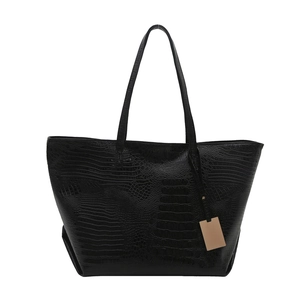 Classic large black tote bag with crocodile pattern texture and long shoulder straps