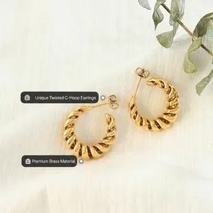 Twisted C-shape earrings made of high-quality brass with a polished gold finish