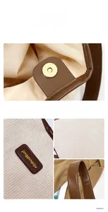 Detail of corduroy tote bag showing magnetic clasp, leather strap, and textured fabric