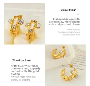 Detailed view of 18K gold plated titanium earrings featuring hollow design and clear zircons
