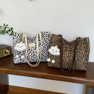 Bohemian leopard print bucket tote bag with plush cloud charm and large capacity