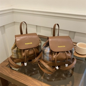 Chic checkered contrast backpack with brown leather trim and fashion print detailing