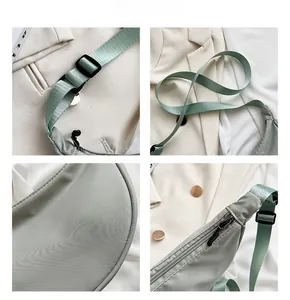 Detailed views of light green nylon crossbody bag with adjustable strap and zip closure