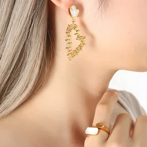 Elegant French gold plated heart drop earrings with shell inlay and matching open ring set