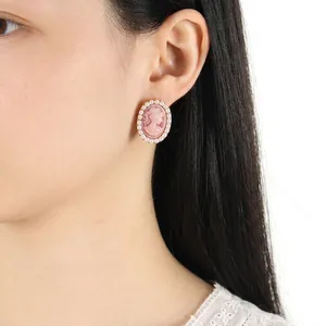 Vintage French cameo earrings with pink portrait and pearls on a gold-tone base