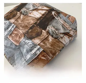 Detail of vintage patchwork denim tote bag showing stitching and retro leather texture