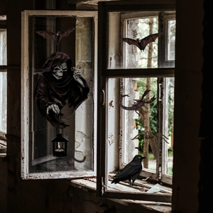 Detailed Halloween window stickers showing grim reaper with lantern and black bats