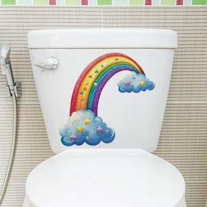 Vibrant rainbow and cloud wall stickers on a white ceramic surface with stars