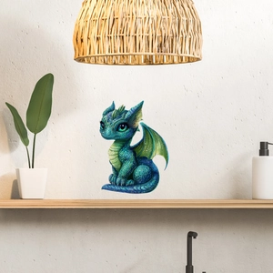 Detailed close-up of a luminous dragon wall sticker on a textured home interior wall