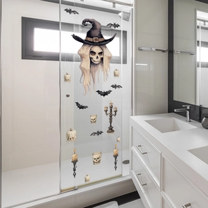 Close-up of Halloween window stickers featuring skulls and bats on glass door