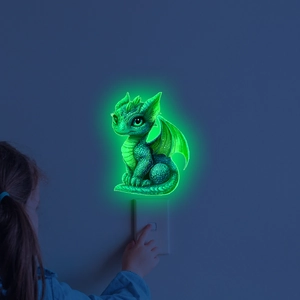 Luminous green dragon wall sticker glowing in dark bedroom above light switch