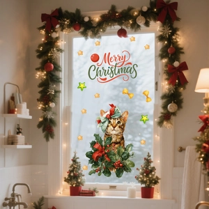 Detail of watercolor tabby cat window sticker with Merry Christmas text and festive stars