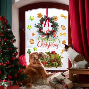 Detail of double-sided Christmas window stickers with gingerbread man and wreath decals