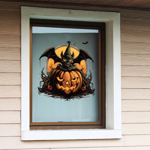 Halloween raamsticker detail van een vleermuis monster op een lichtgevende pompoen