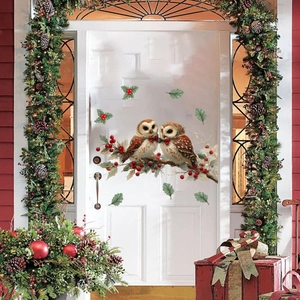 Detailed Christmas owl wall stickers with holly berries on a white decorative door
