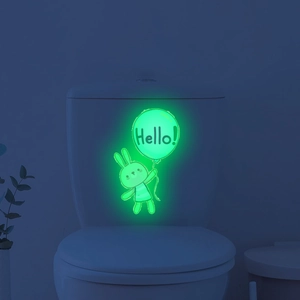 Glow in the dark bunny and balloon wall sticker showing green luminous effect in the dark