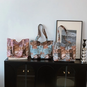 Three large printed canvas tote bags with vintage denim patterns for women's daily commute