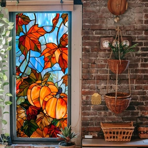 Close-up of fall pumpkin and maple leaf window sticker with stained glass art style