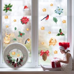 Detail of Christmas window clings with watercolor gingerbread, bunny and holly patterns