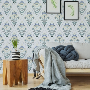 Detail of vintage floral wallpaper with Nordic patterns in a cozy living room setting