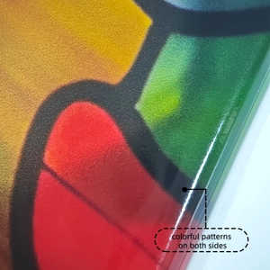 Detail showing colorful double-sided pumpkin and maple leaf patterns on static window clings