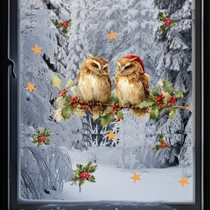 Detail of Christmas window stickers featuring two owls on holly branches with snowy background