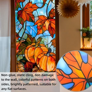 Detail of static cling window film with stained glass autumn pumpkin and maple leaf patterns