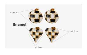 Detailed view of checkered heart and round enamel stud earrings with gold finish