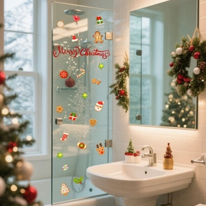 Detail of Merry Christmas window stickers featuring gingerbread man and reindeer motifs