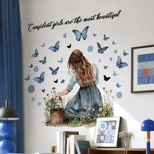 Creative wall decal featuring a girl with blue butterflies and inspirational quote