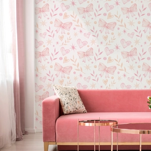 Watercolor wallpaper with pink bows and golden hearts in a stylish living room