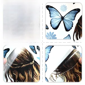 Detail of self-adhesive wall decals showing blue butterflies and artistic girl design