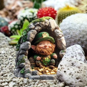 Detail of St. Patrick's Day garden gnome in rock cave with gold coins and clover decoration
