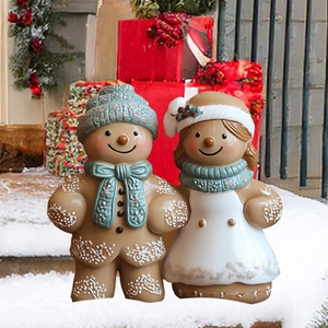 Détails de figurines de pain d'épices pour jardin avec motifs de glaçage délicats