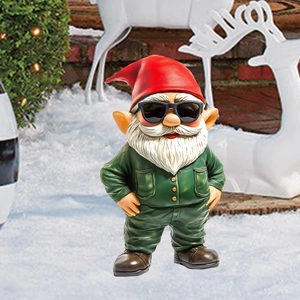 Detailed close-up of a Christmas gnome garden stake with sunglasses in a snowy yard