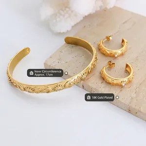 18K gold plated jewelry set with sun and moon relief carvings and zircon accents