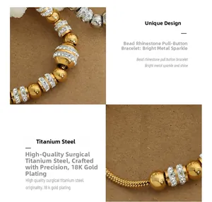 Detail of 18K gold plated stainless steel bead bracelet with sparkling rhinestones