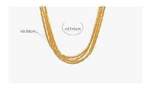 Detailed view of triple-layered 18K gold-plated necklace with 0.08cm link width dimensions